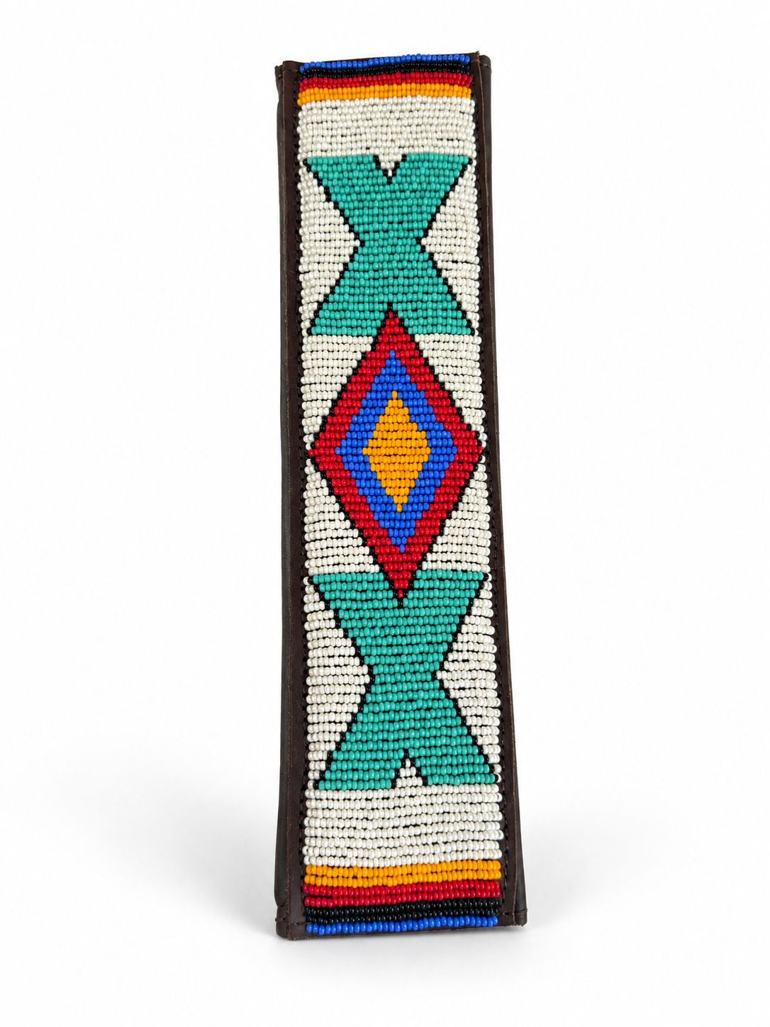 Side view of a cream and turquoise beaded seat belt cover showing the brown leather edging